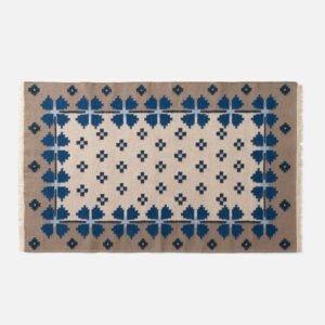 Open flora wool flatweave rug::indigo::main in zoom modal
